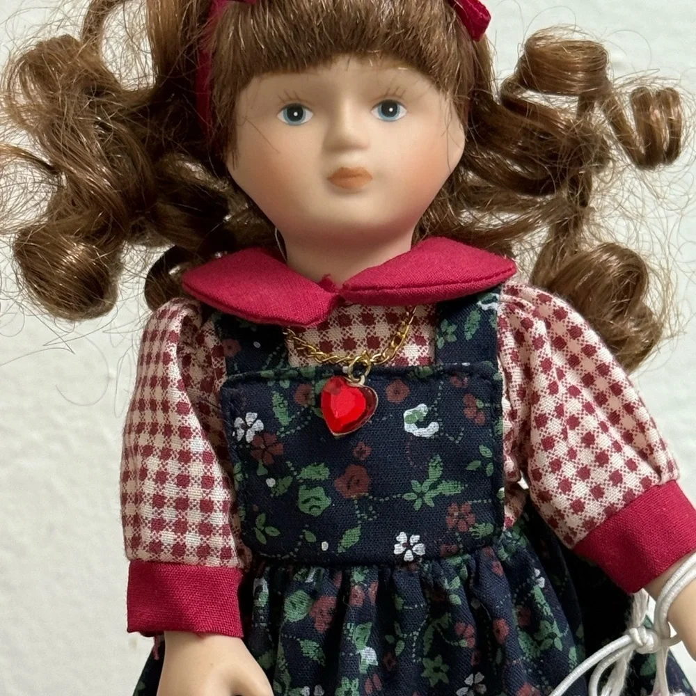 Russ Doll with Navy Floral Dress and Red Accents